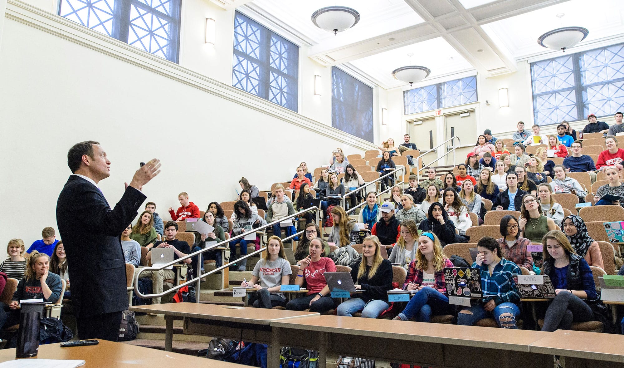 A professor giving a of students a lecture.