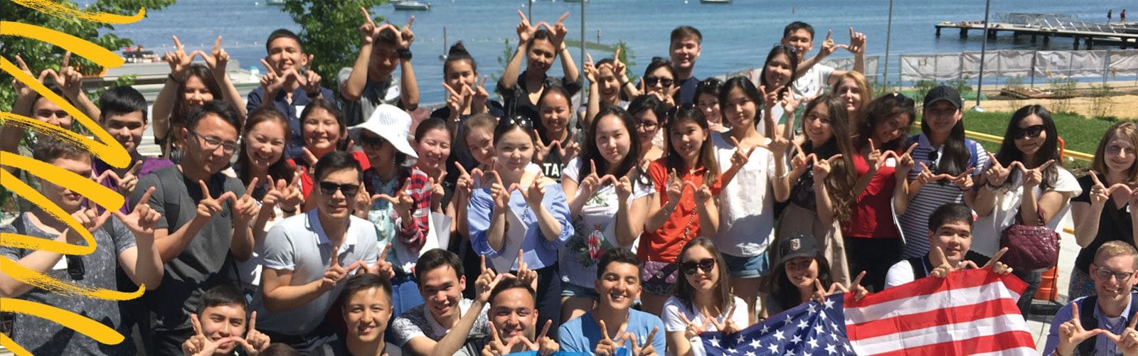 A group of international students taking a group picture.