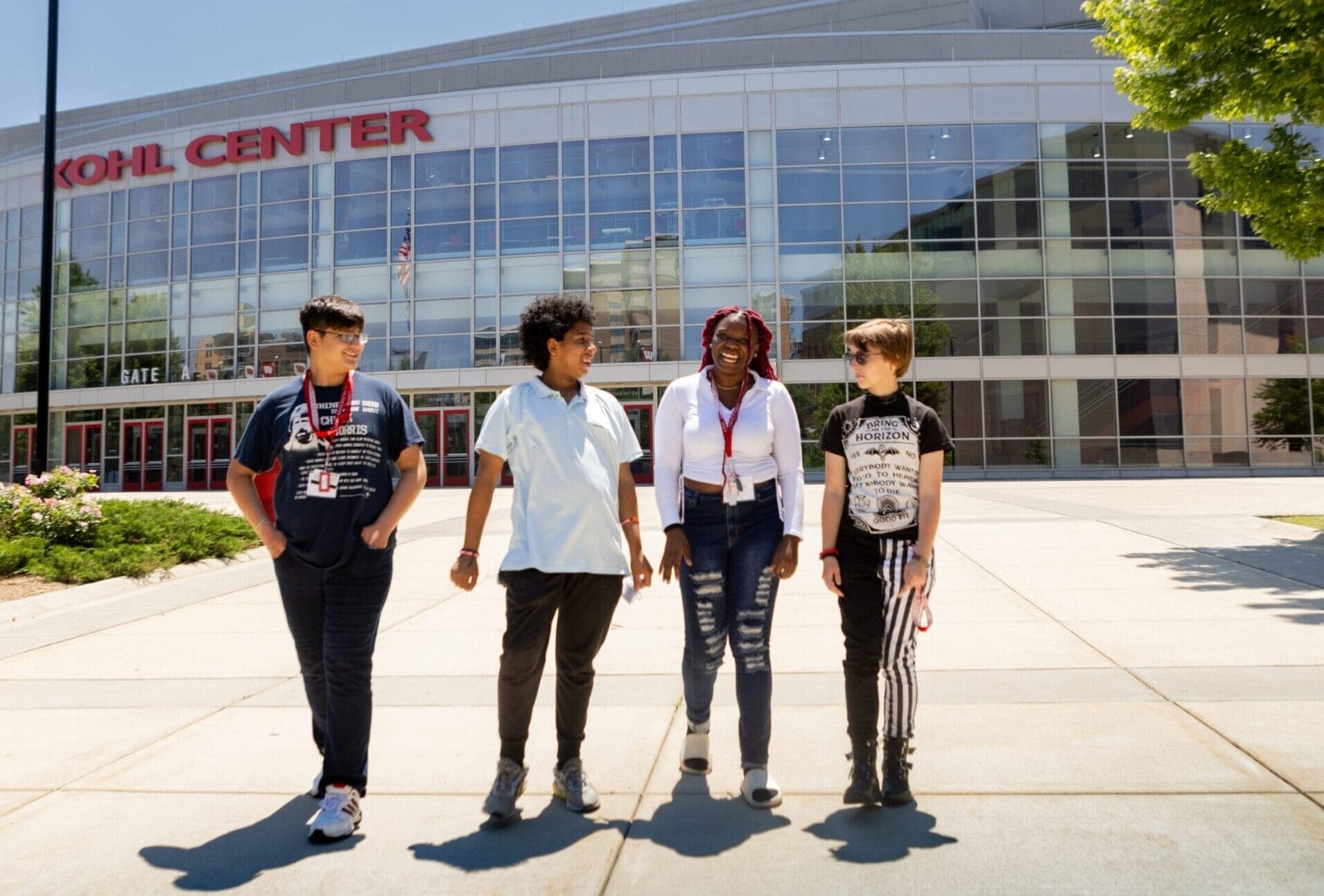 Summer Precollege students walking outside of the Kohl Center on campus