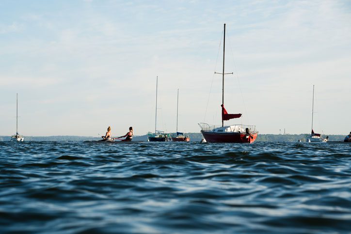 sailboats peacefully floating on Lake Mendota