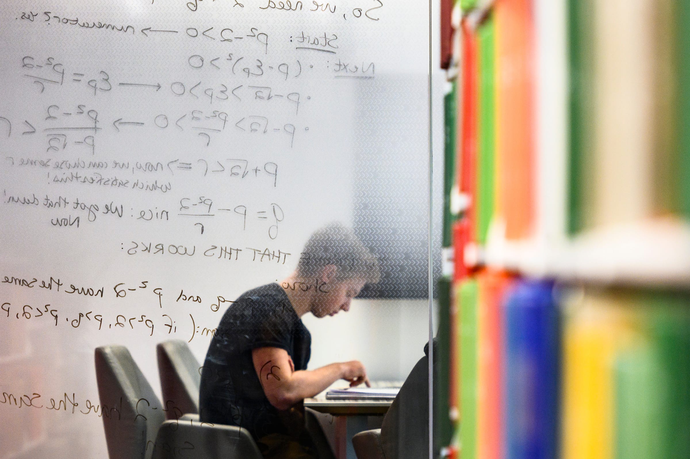 Student working in the Grainger library