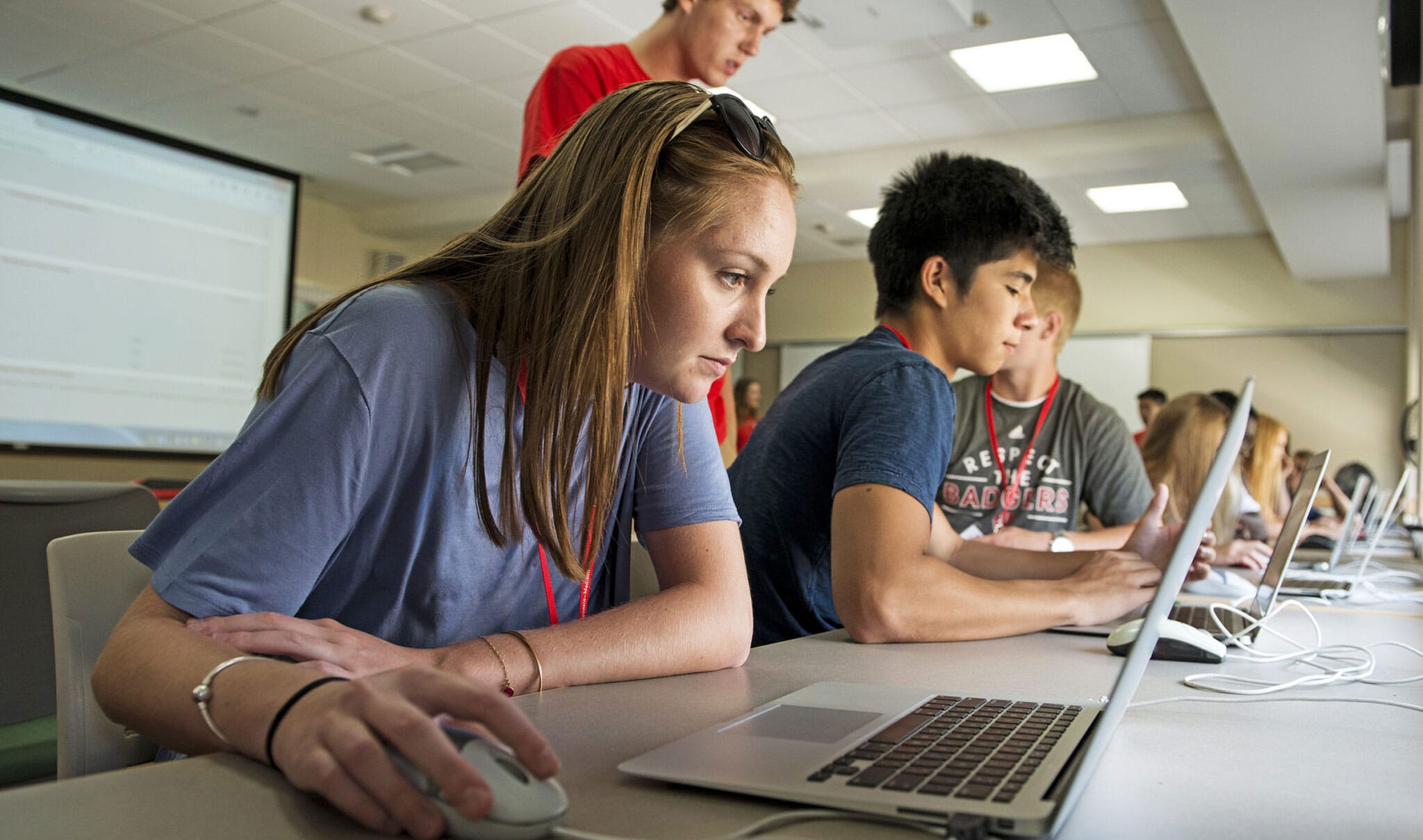 Students working on their laptops.