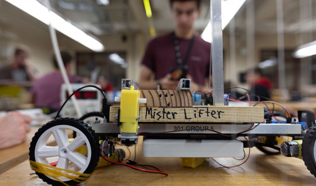 A close-up of a robot mechanical students are working on.