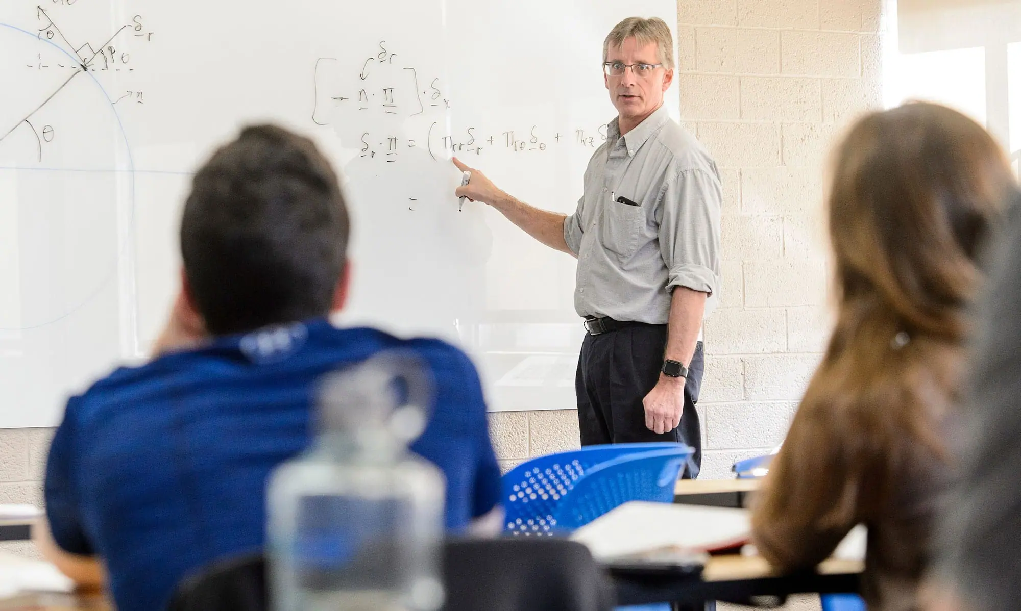 Chemical Engineering professor Dan Klingenberg speaking to class