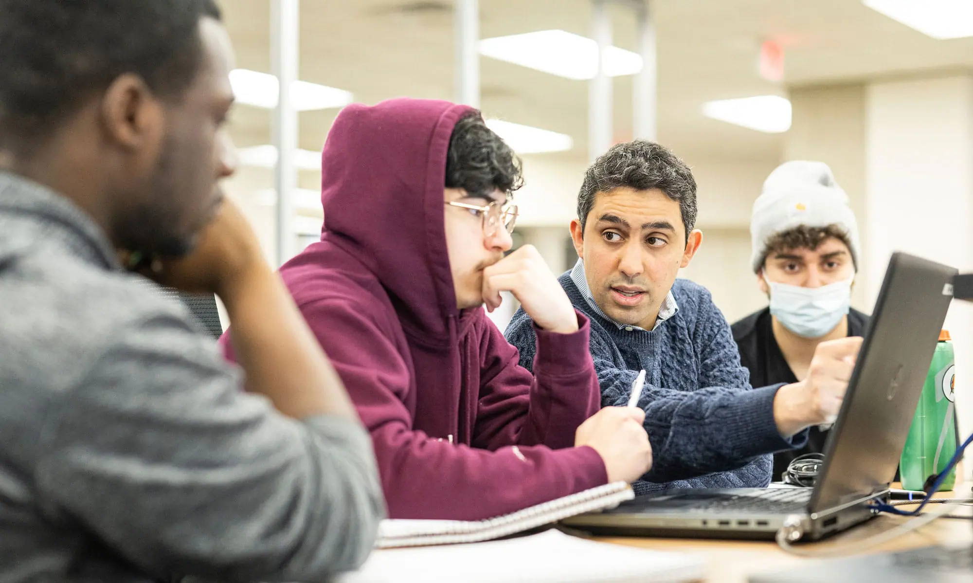 Professor Kassem Fawaz speaking with Engineering students