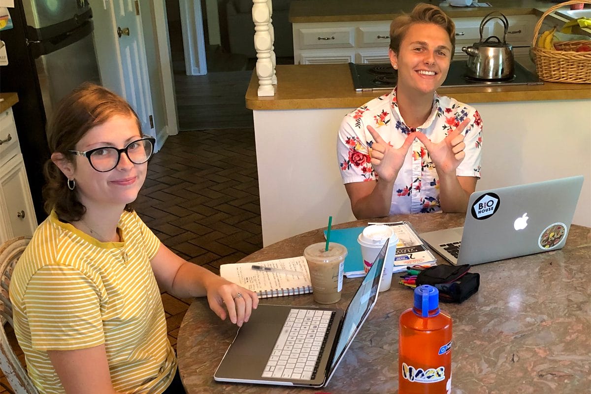 UW-Madison Summer Term student Henry Lee at dining room table with sister Deirdre