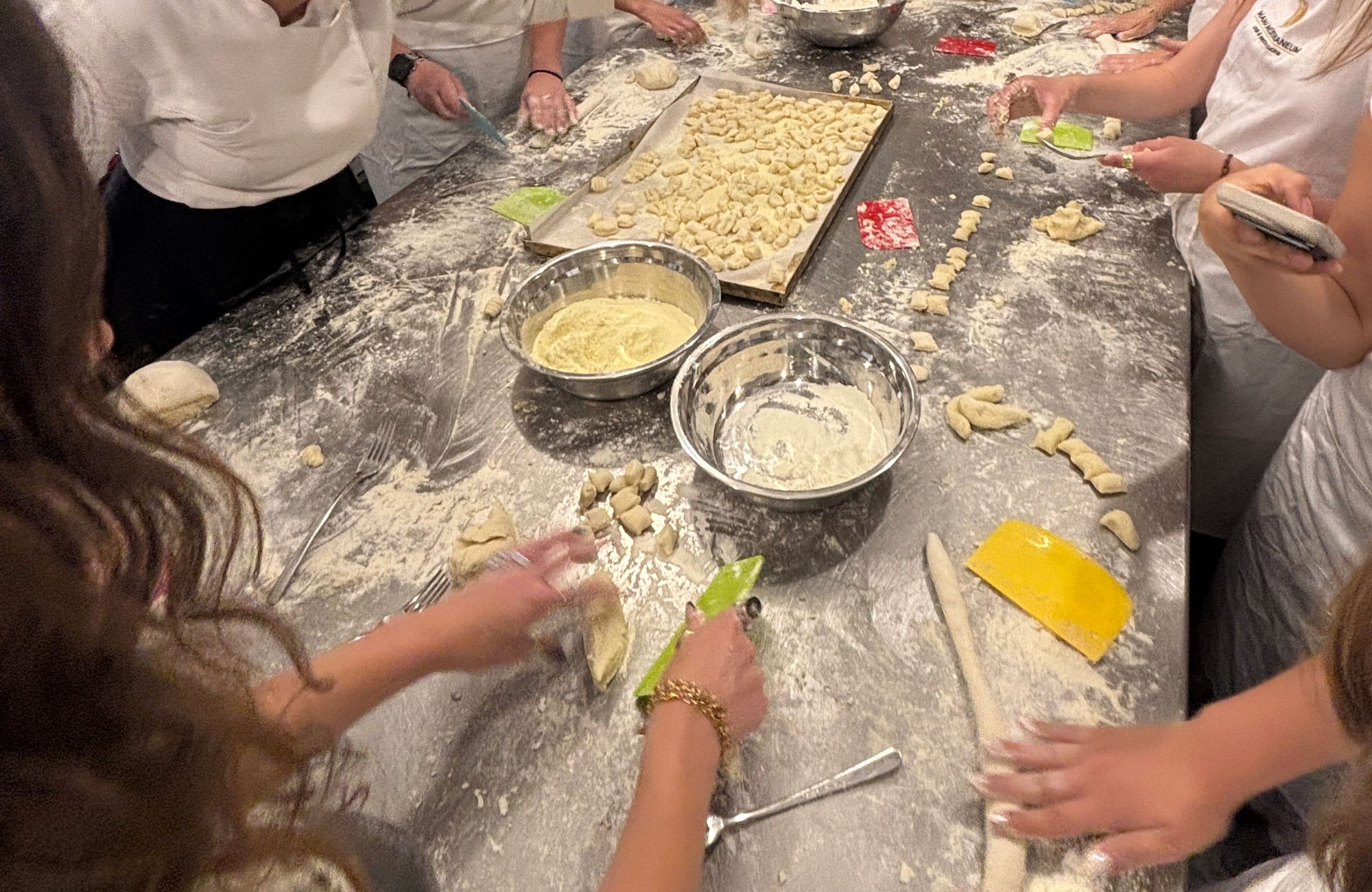 Students got hands-on experience with food in their pasta-making class.