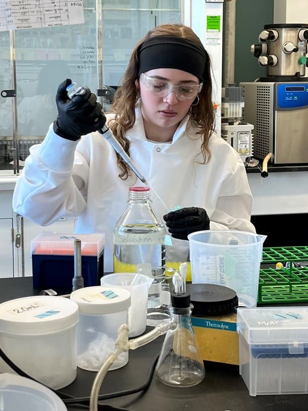 Isadora Collins working in a lab